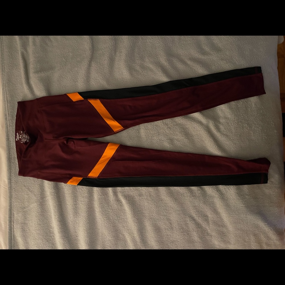 REEBOK maroon leggings with orange stripe
